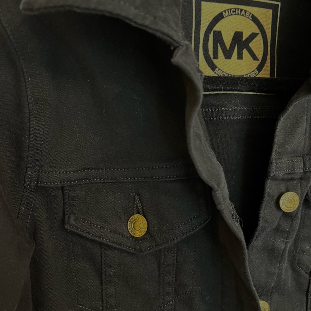Michael Kors black denim jacket.